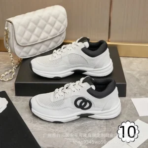 Chanel Elegant Sneakers with Logo Design
