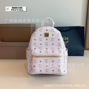 MCM Elegant Mini Backpack with Gold Accents