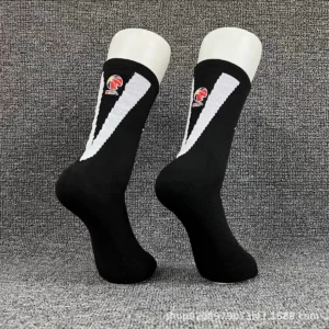 Black CBA Basketball Socks with White Stripe Design