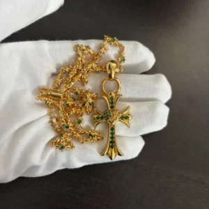 Golden Cross Pendant with Emerald