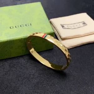 Gucci Gold Bangle with GG Logo